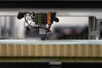 Cylindrical cells being loaded into Archer’s proprietary battery pack via automated manufacturing process (Photo: Business Wire)